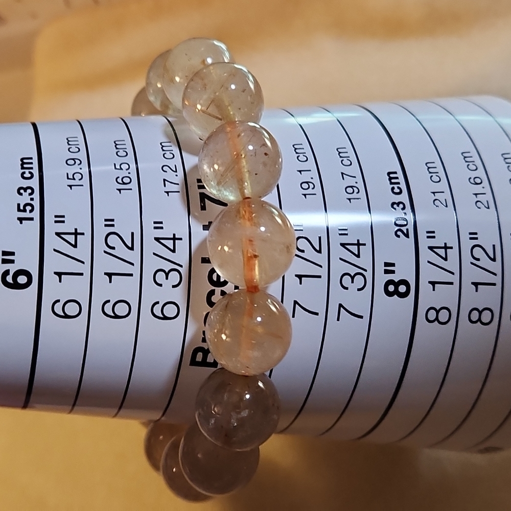 Gold Rutilated Quartz stretch bracelet.  Buy one bracelet get 2nd 20% off